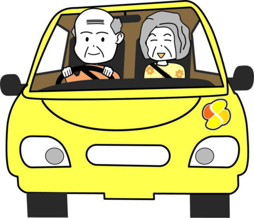 高齢者夫婦が車を運転